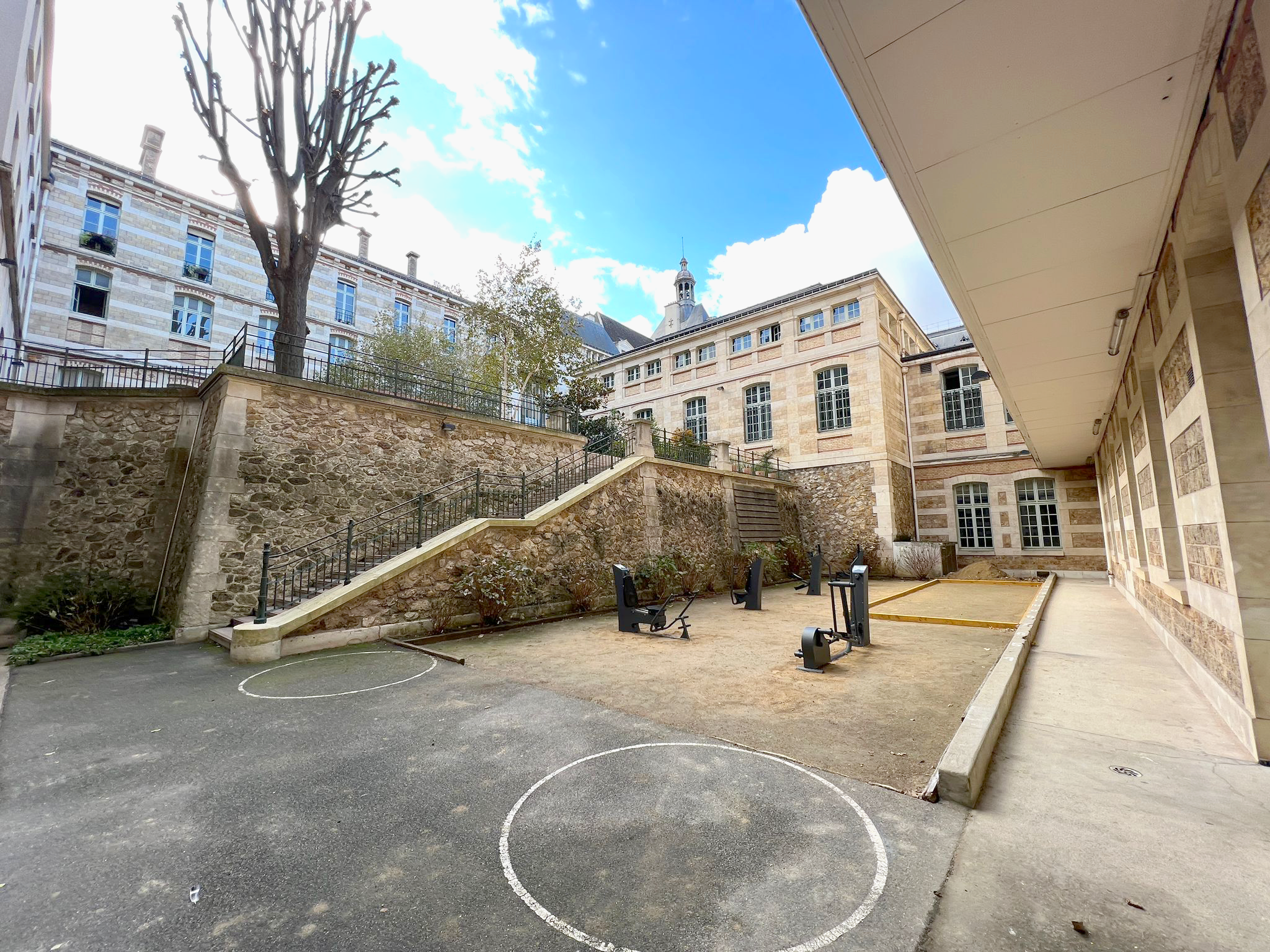 Strength training equipment in a high school
